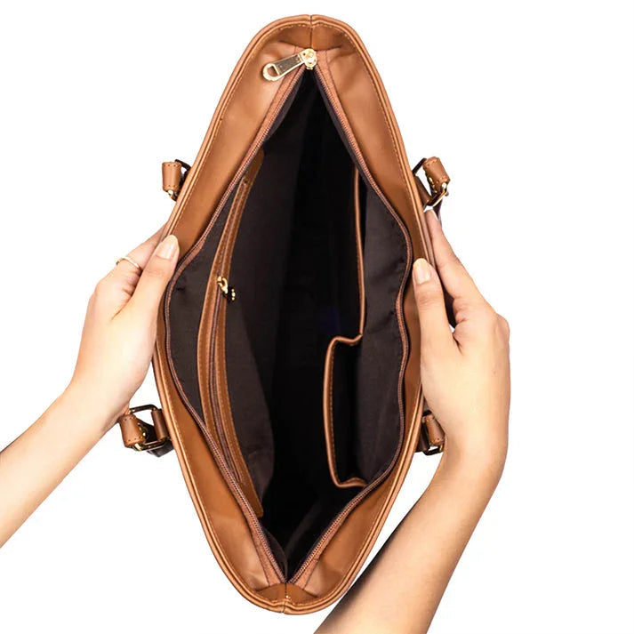 Cinnamon cocoa sling bag with spacious interior and zippered pockets for organized storage