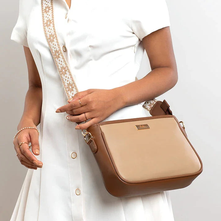 Stylish cinnamon cocoa sling bag with a unique strap design for everyday use