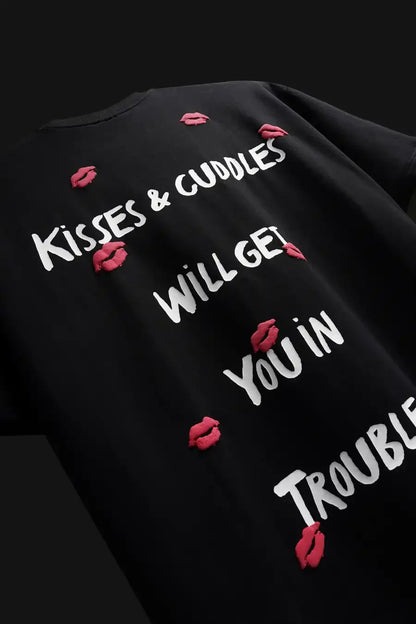 Black t-shirt with white text and red lip emojis on a black background