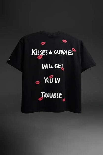 Black t-shirt with white text and red lip prints on a dark background