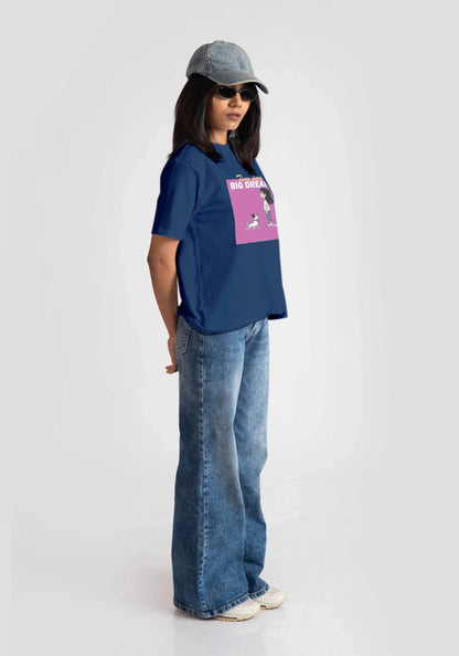 Stylera cute print blue t-shirt for women worn with light denim jeans and cap