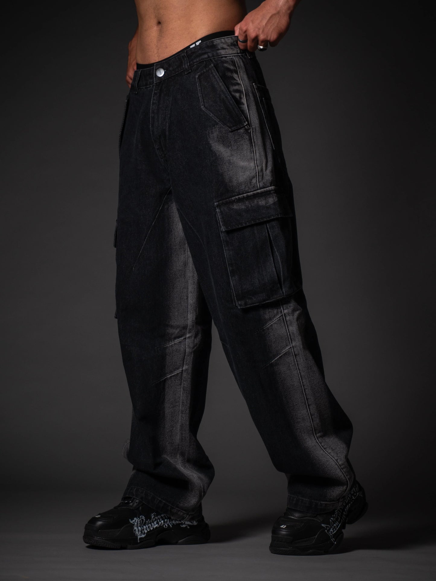 Close-up of distressed rugged jeans texture and 14 oz heavy duty cotton fabric.
