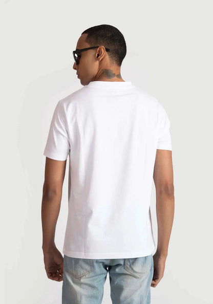 Stylera white regular fit t-shirt shown from back worn by male model with sunglasses