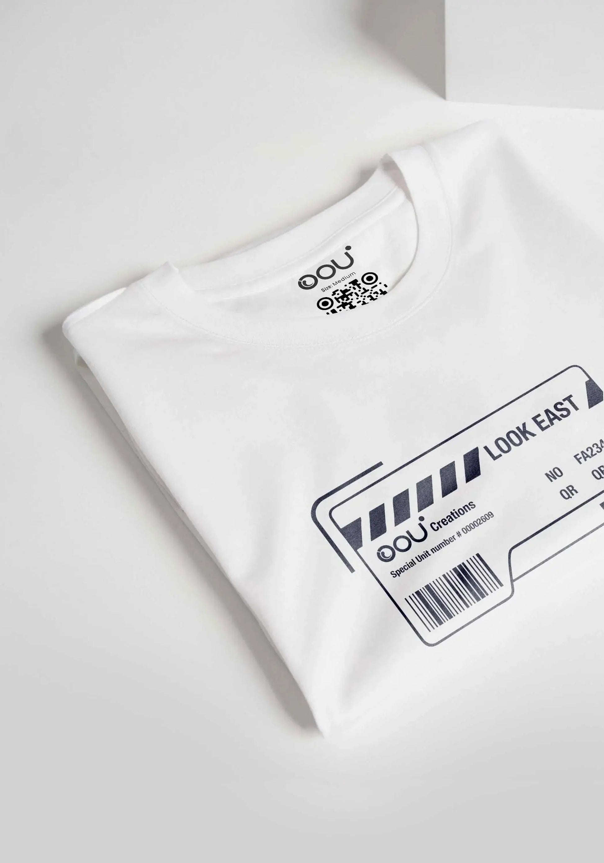 Folded white regular fit t-shirt from Stylera with printed graphic design on front