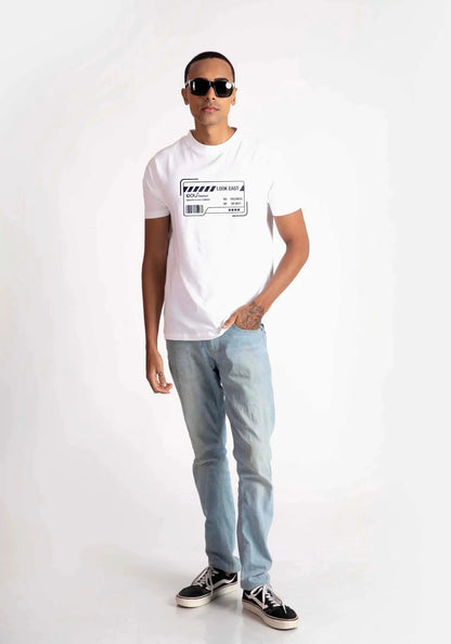 Man wearing Stylera white regular fit t-shirt with graphic design and light blue jeans