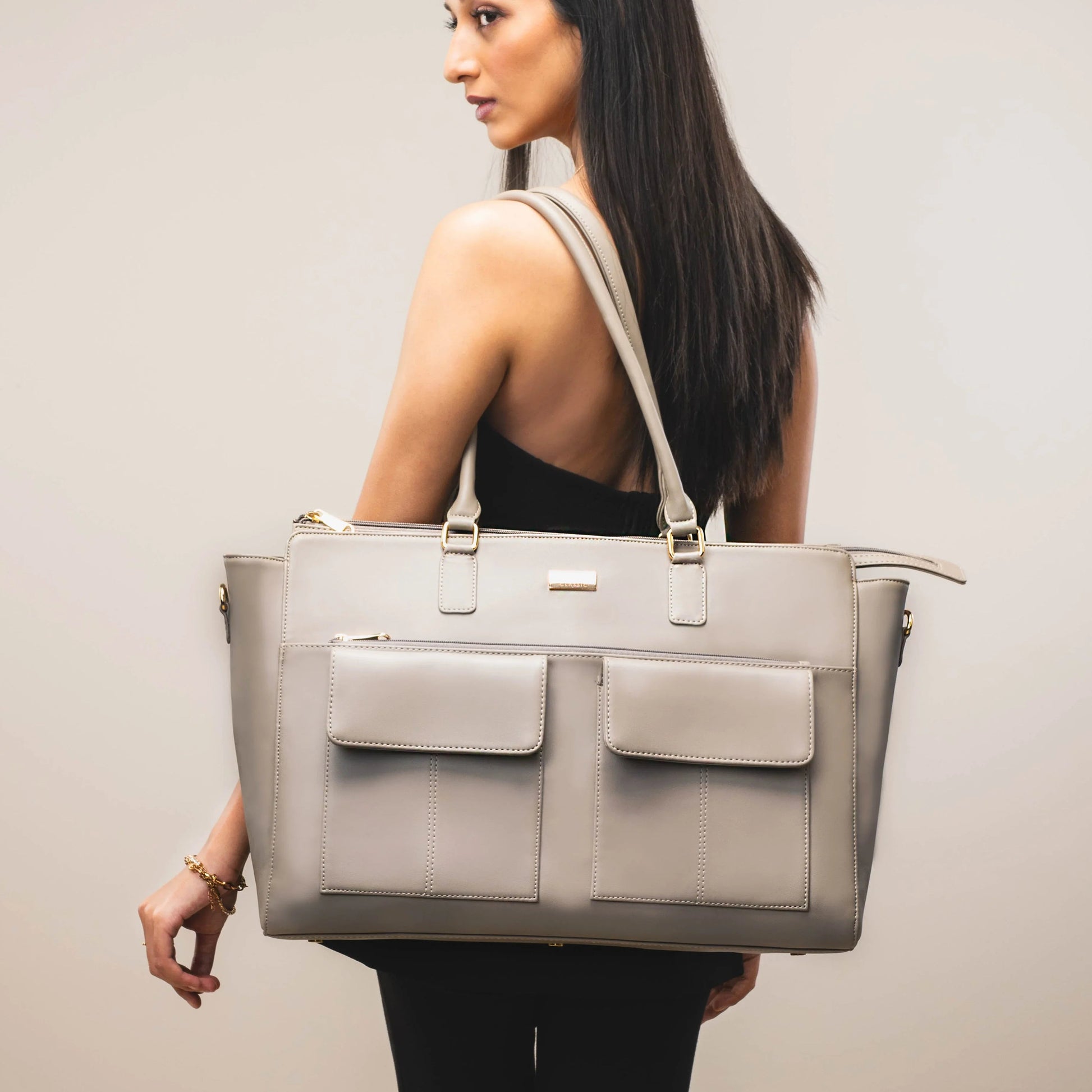 Fashionable laptop tote bag by Stylera with spacious design and multiple pockets for everyday use