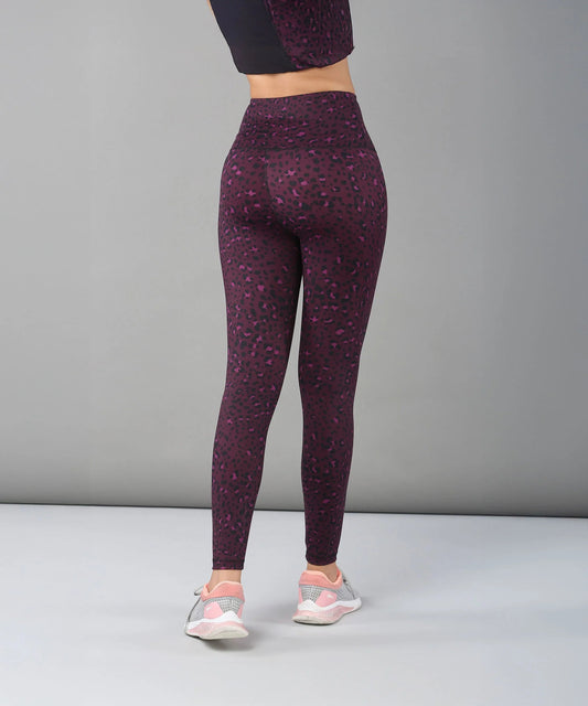 Stylish purple and black leggings for women, perfect for workouts and casual wear, featuring a high waistband
