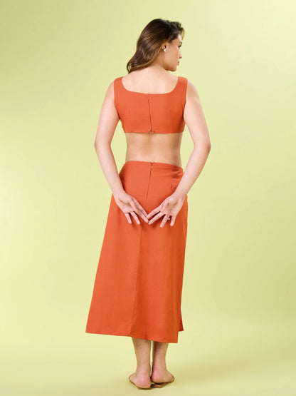 Model wearing the coral crush rayon co-ord set styled for a holiday brunch.