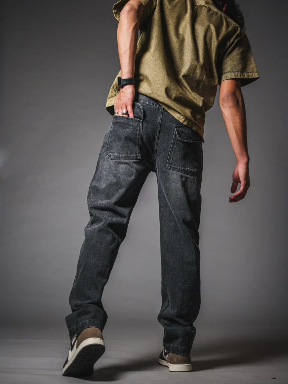 Close up of the structured fabric block on knee panel denim jeans.