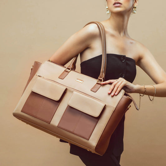Stylish oversized tote bag in brown and beige, featuring a large tote purse with laptop compartment.