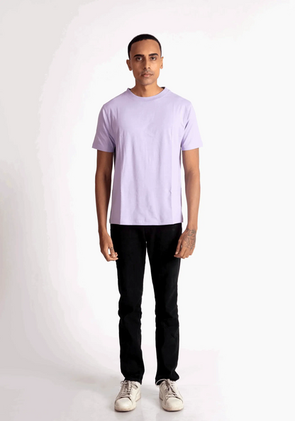 Stylera lavender t-shirt for men paired with black pants and white sneakers