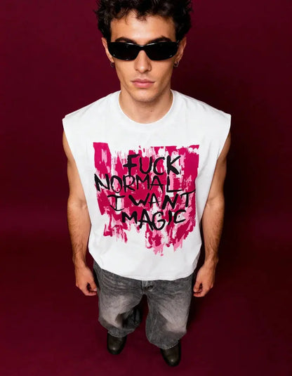 Person wearing a sleeveless shirt with a bold graphic and text on a dark background