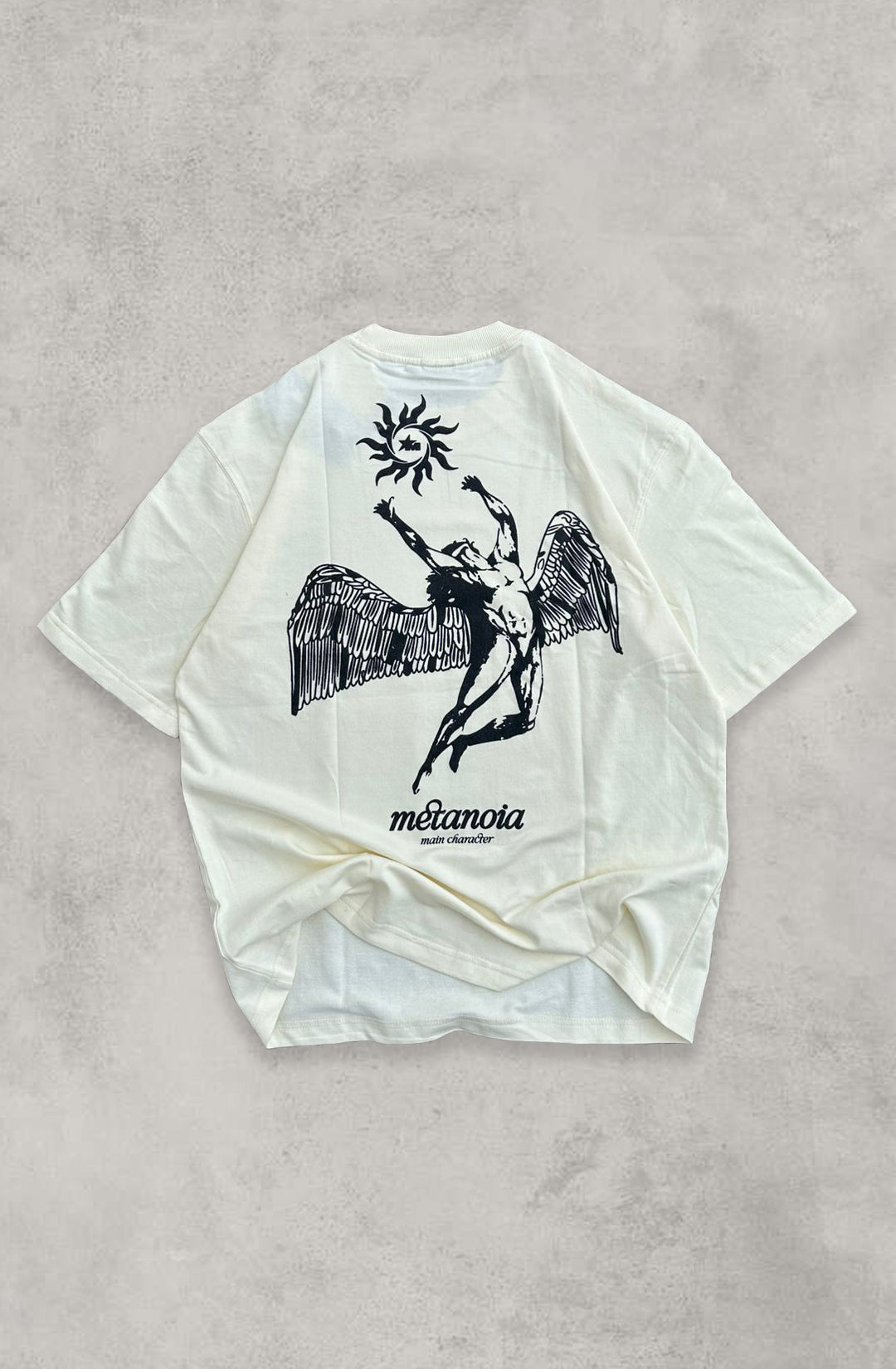 Metanoia Printed Cream Oversized T-Shirt Main Character