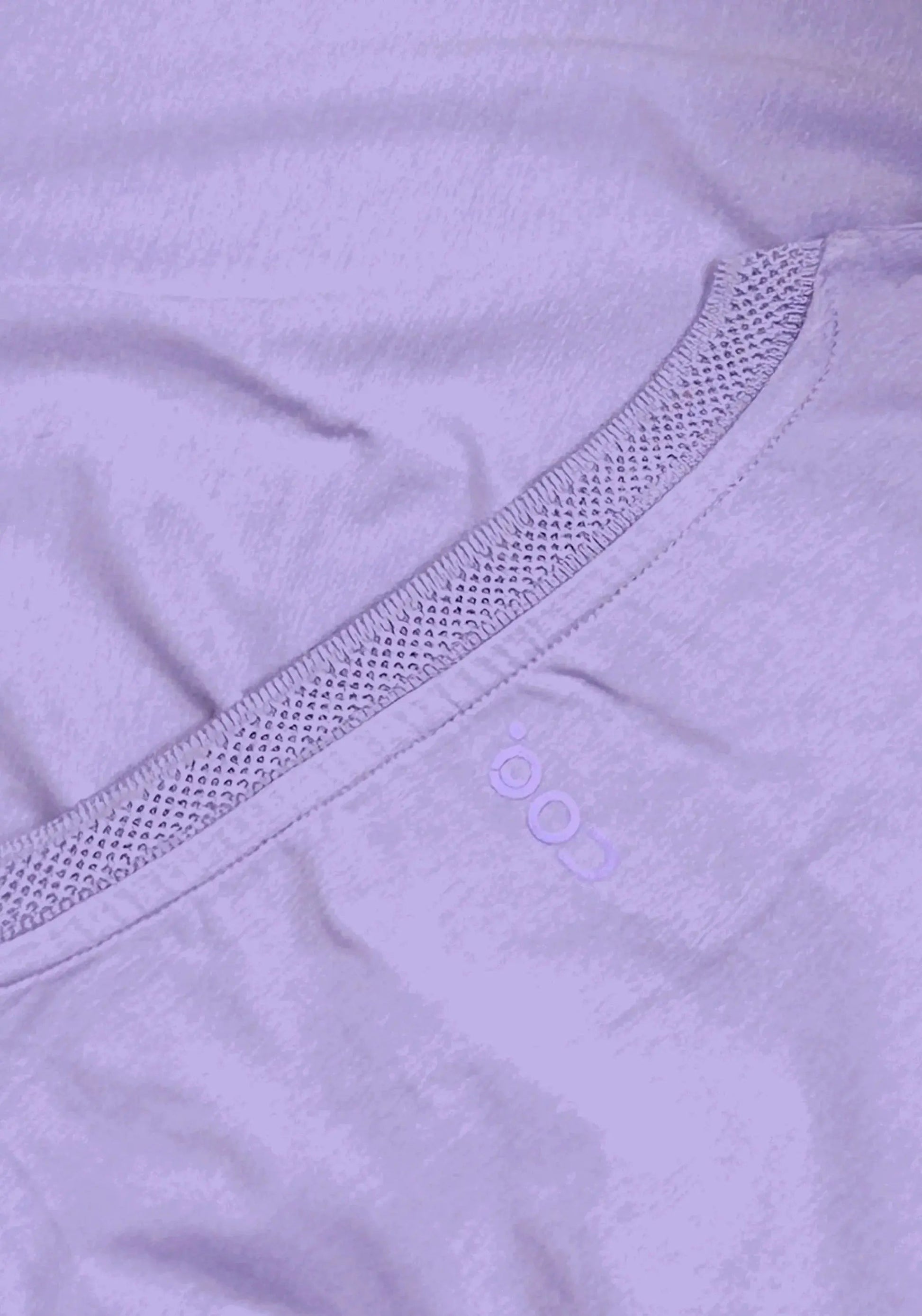Close-up of Stylera men's regular fit lavender tee showing textured neckline and fabric detail
