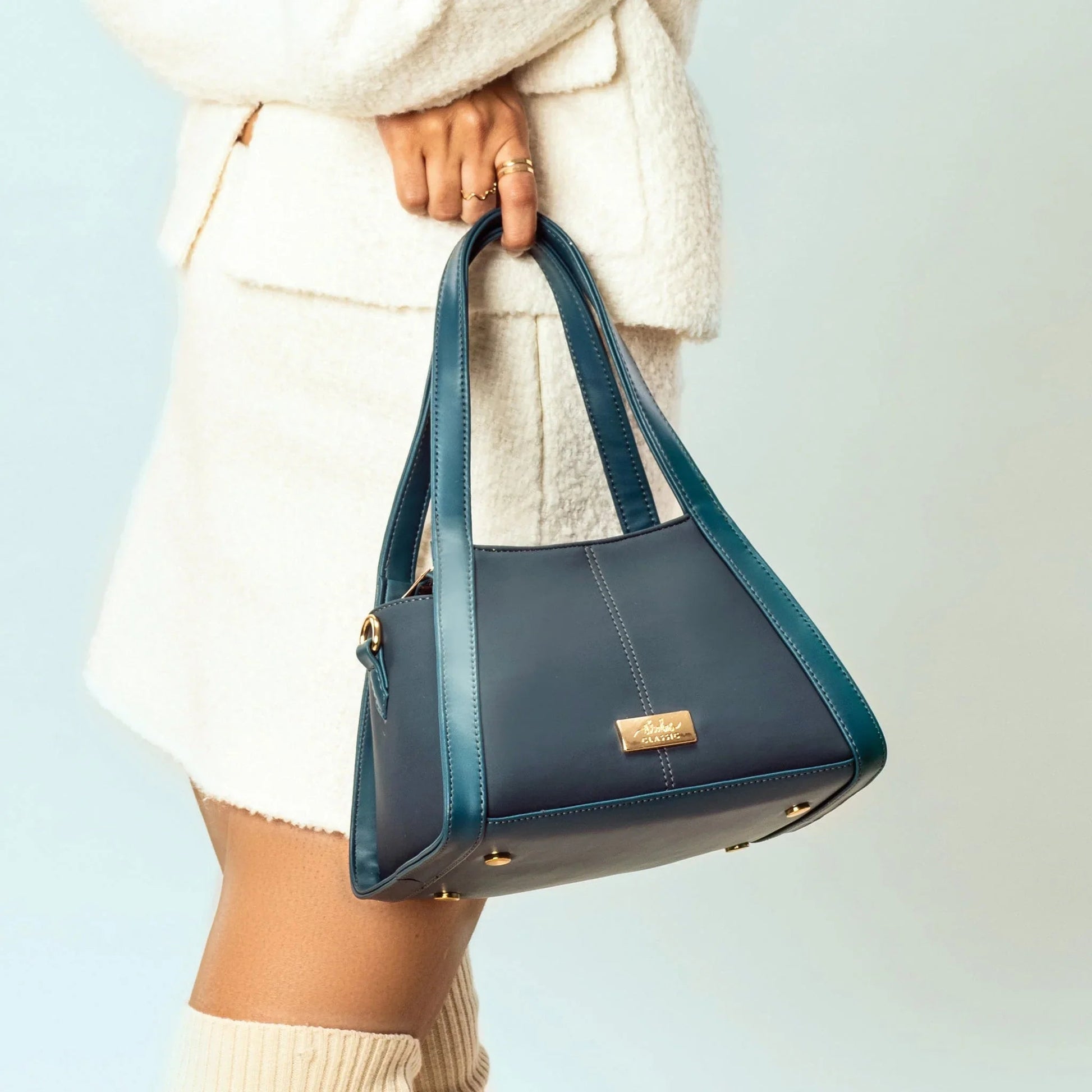 Stylera peacock small handbag in blue with stylish handles for everyday use