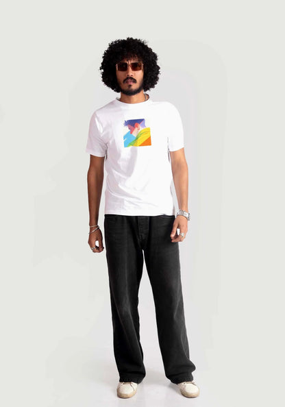 Man wearing Stylera regular fit white tee with colorful graphic and black pants
