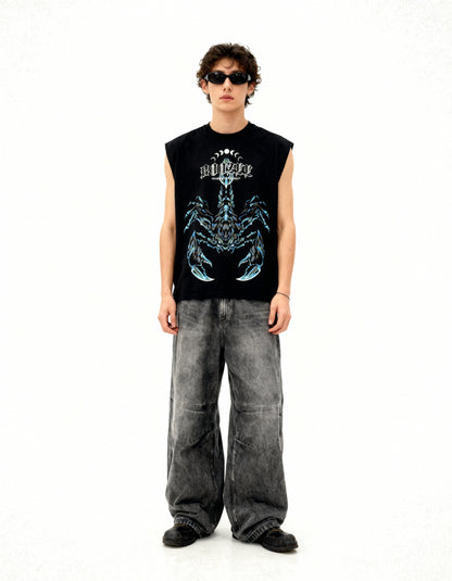 Person wearing a black sleeveless shirt with a graphic design and gray pants on a white background