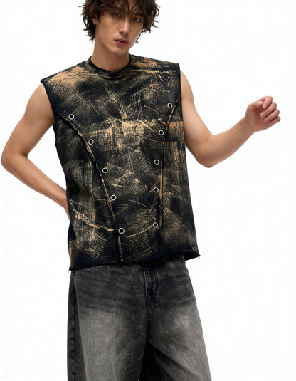 Person wearing a sleeveless, patterned top with a white background