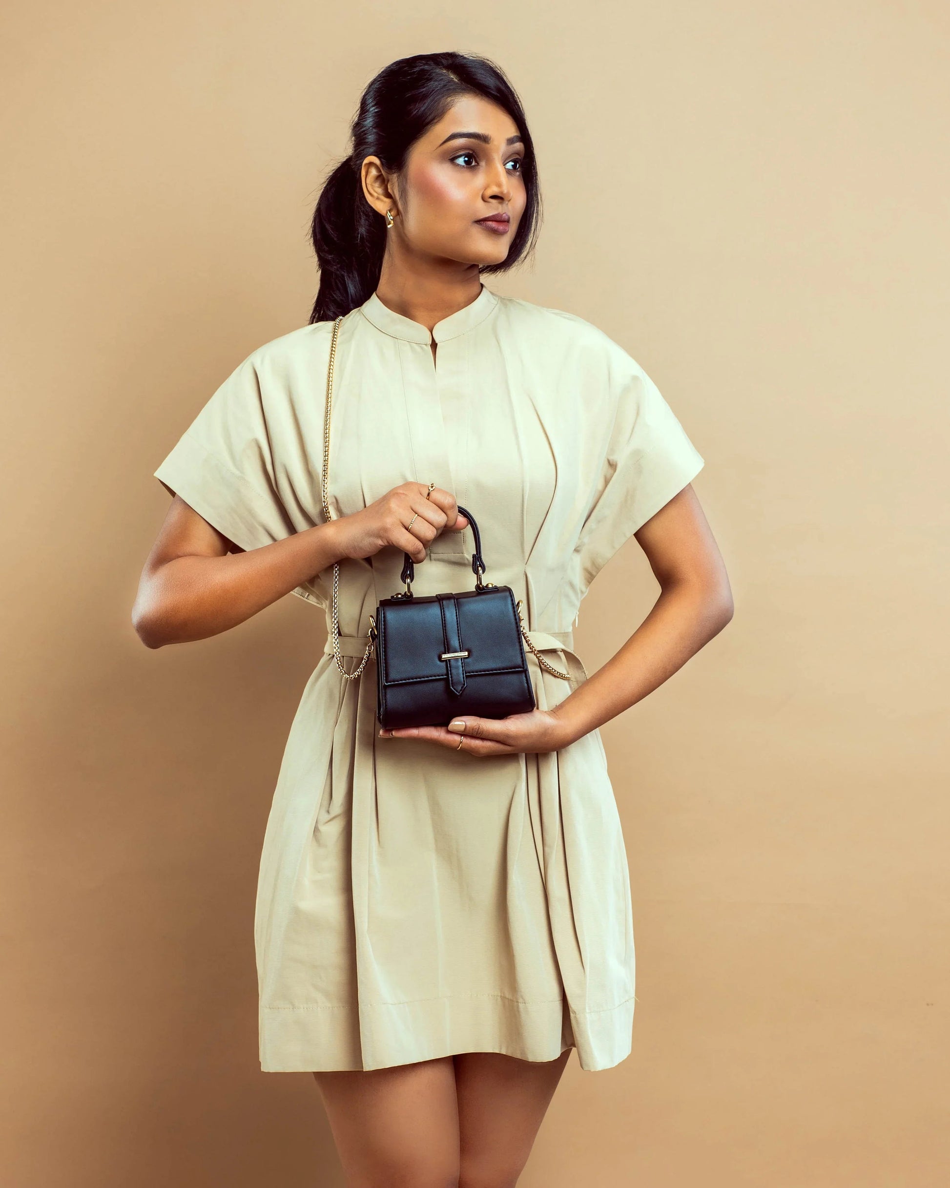 Stylish small shoulder bag for women in black, perfect for chic outfits and daily use