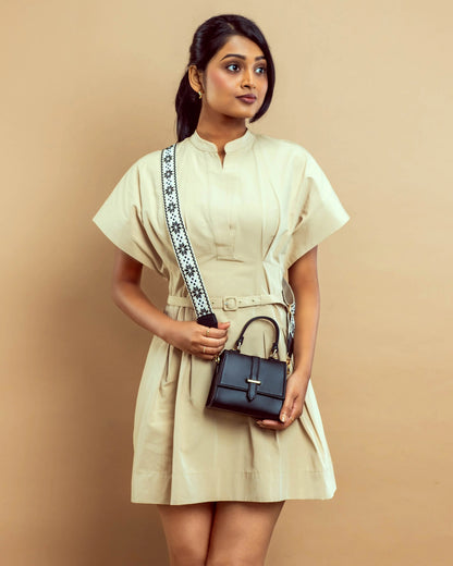 Stylish small shoulder bag for women by Stylera, paired perfectly with a chic beige dress