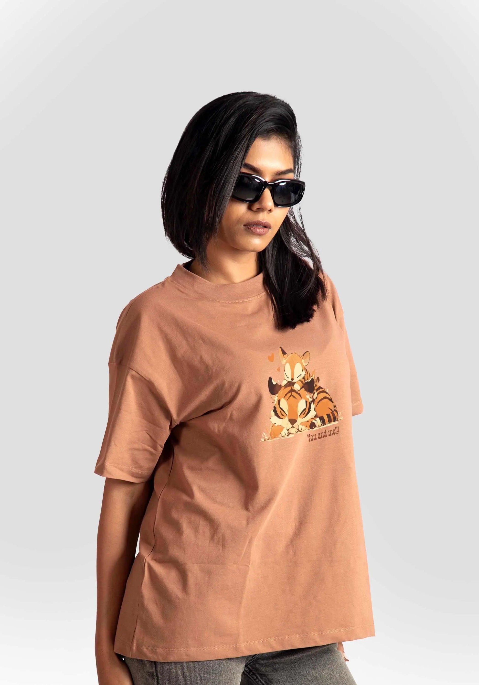 Stylera womens graphic oversized mocha tee featuring a relaxed fit and cartoon graphic on the front