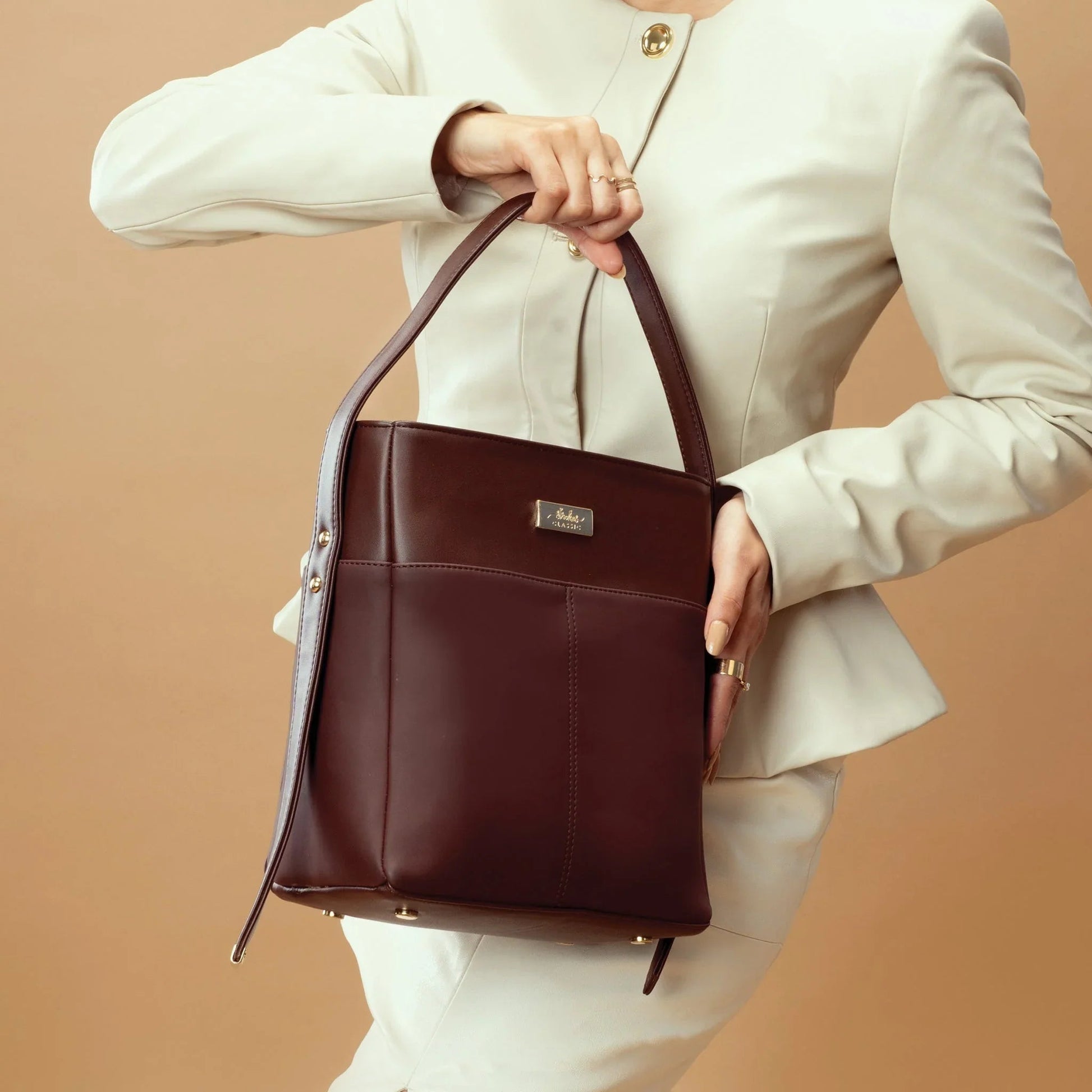 Stylera women's leather shoulder bag in rich brown color, perfect for stylish outings